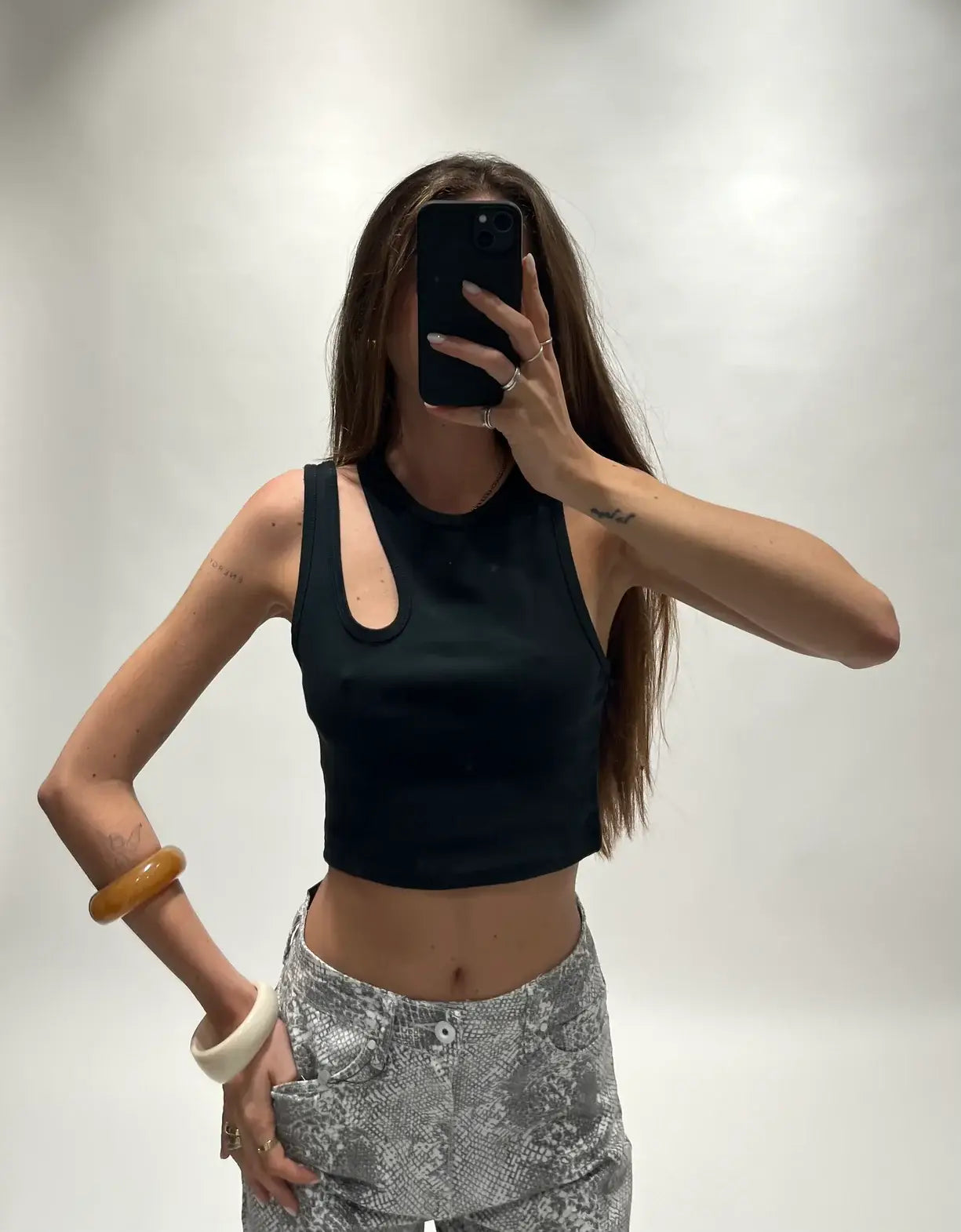 Vest top with shoulder cut-out 