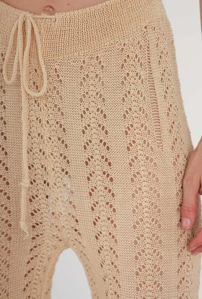 Cream lace trousers